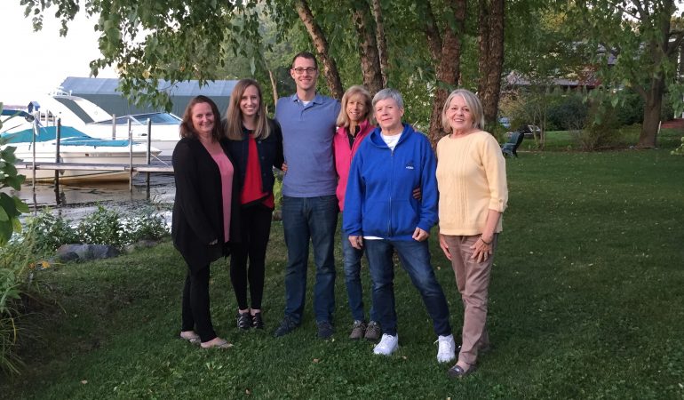 Office staff and family party at Lake Minnetonka